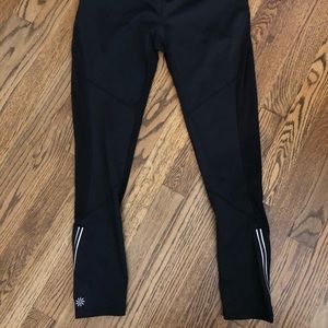 Athleta Black workout pants with ankle zip